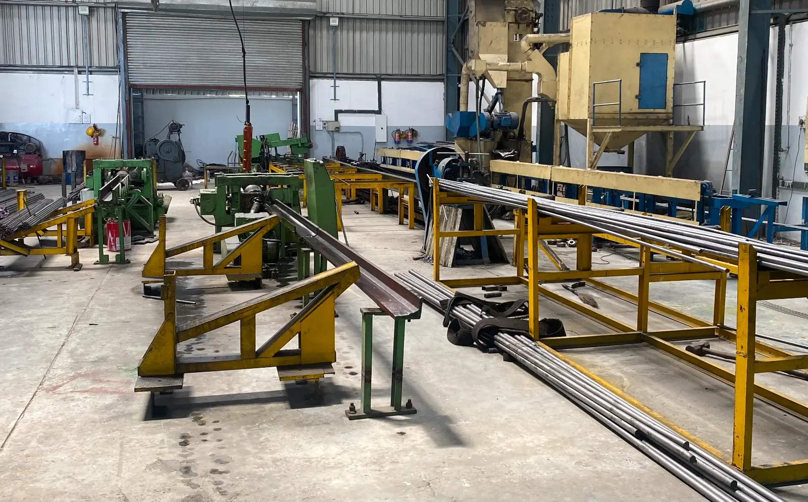 The interior of the Marbrite Steel manufacturing facility in Delhi, showing machinery for cold drawing bright bars.